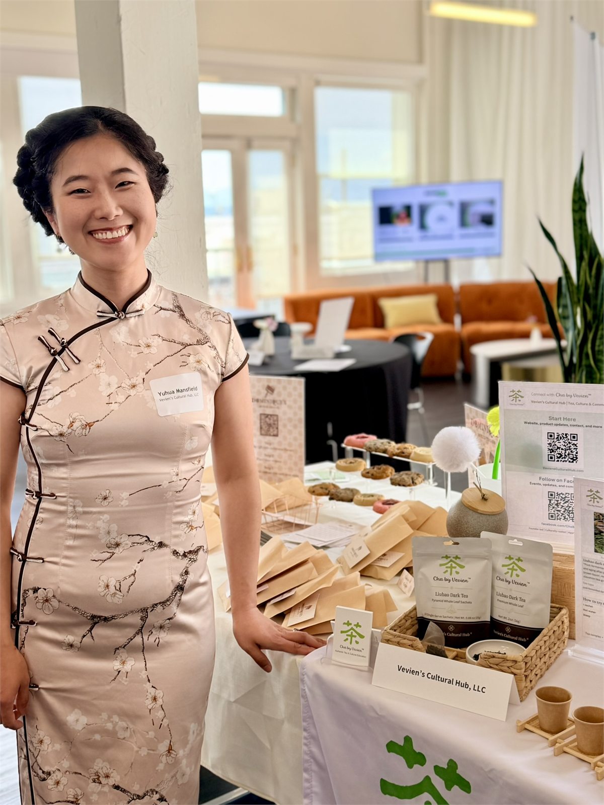 Founder at a Cha by Vevien tea table display
