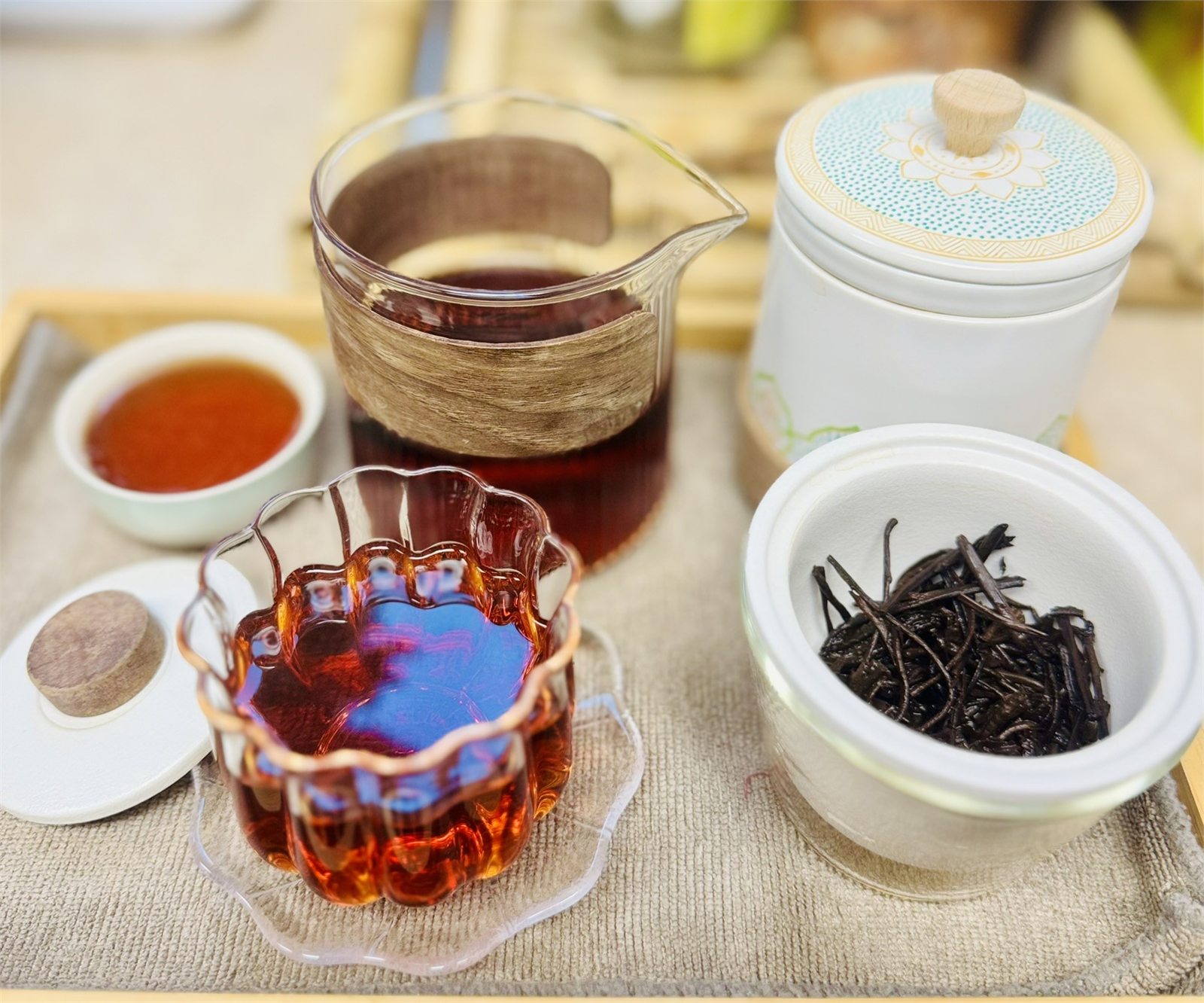 Brewed dark tea and loose Liubao leaves